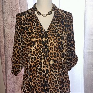 Leopard print, sheer, adjustable sleeves, button up, two pockets.